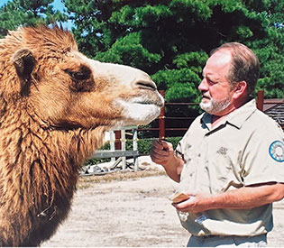 John Bergmann with camel.