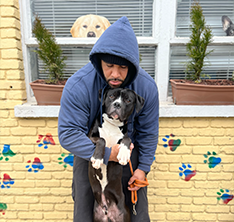 Photo of a man and a dog. Link to Gifts of Life Insurance.